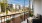 Furnished outdoor patio at Ava Oakwood apartments in Gainesville