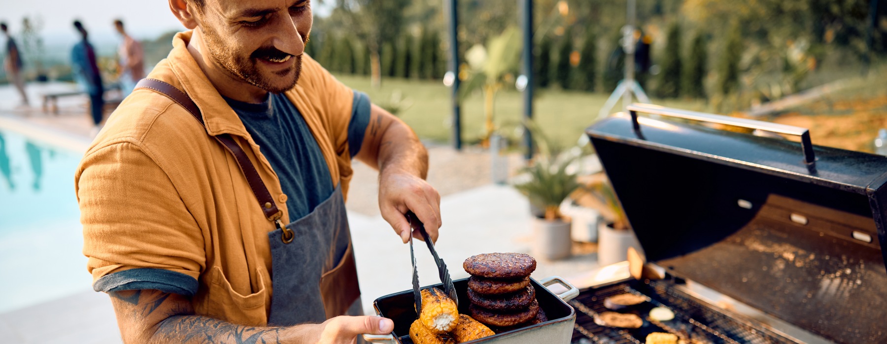 resident grilling by the pool