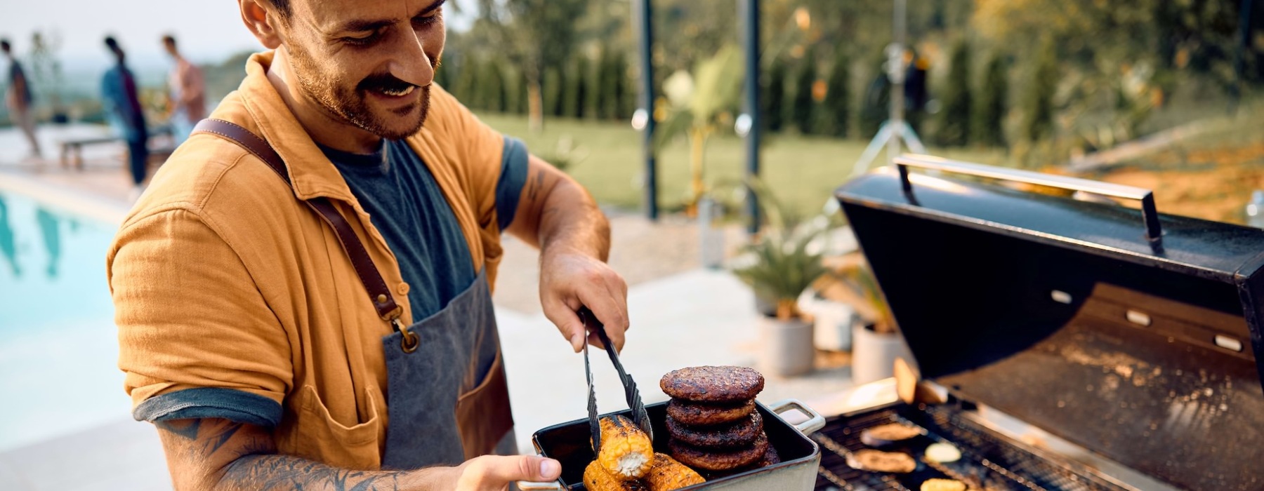 resident grilling by the pool